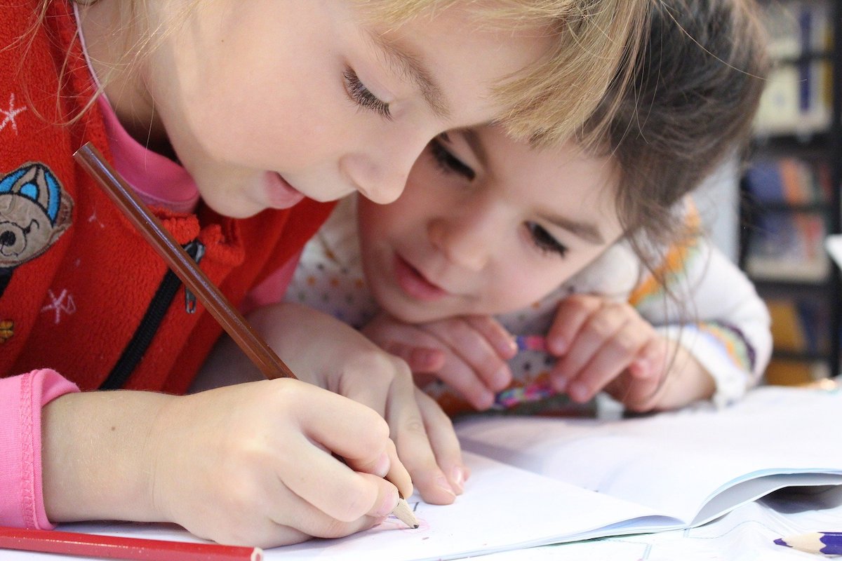 Kids sitting at a school desk